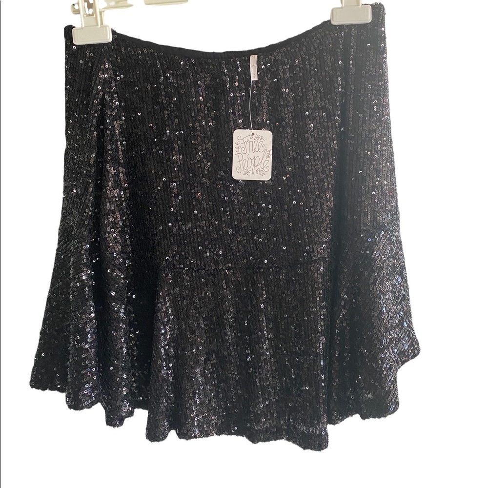 Sequins mini skirt. Drop waist
